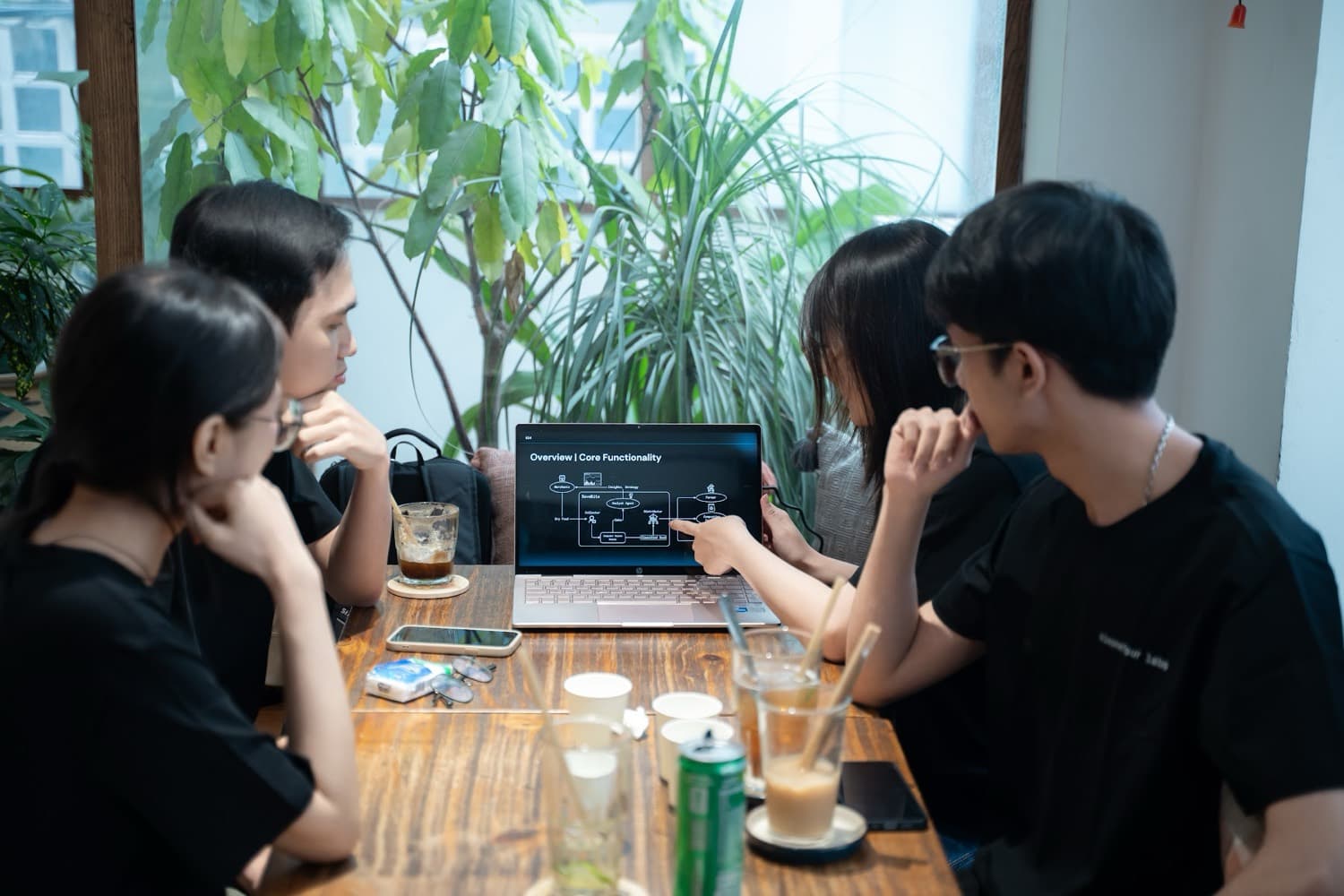 sixonefour labs residents reviewing a system architecture together